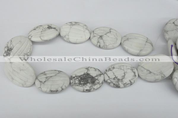 CWB70 15.5 inches 30*40mm carved oval natural white howlite beads