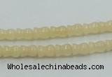 CYJ63 15.5 inches 6*7mm vase-shaped yellow jade gemstone beads wholesale