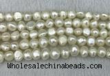 FWP245 15 inches 8mm - 9mm baroque white freshwater pearl strands