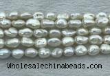 FWP351 15 inches 8mm - 9mm baroque white freshwater pearl strands